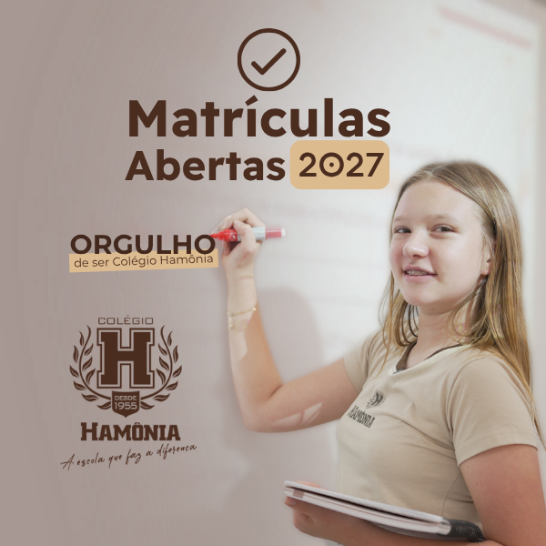 Menina escrevenda num quadro branco "Orgulho de ser Colégio Hamônia" 